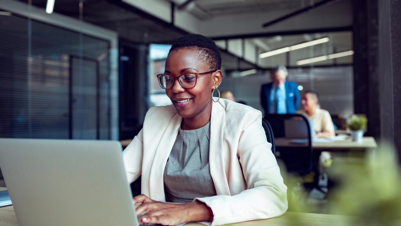 Close up of a young businesswoman working in an office